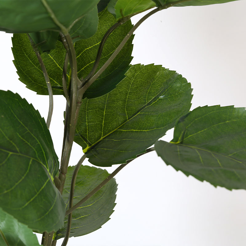 Árbol de alocasia artificial en maceta negra mate