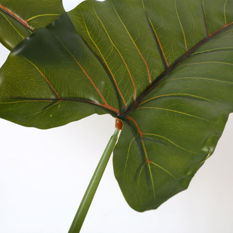 Árbol de alocasia artificial en maceta negra mate