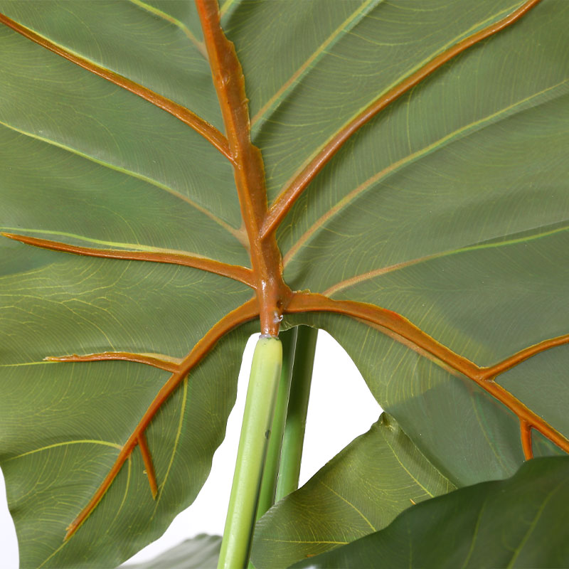 Árbol de alocasia artificial en maceta negra mate